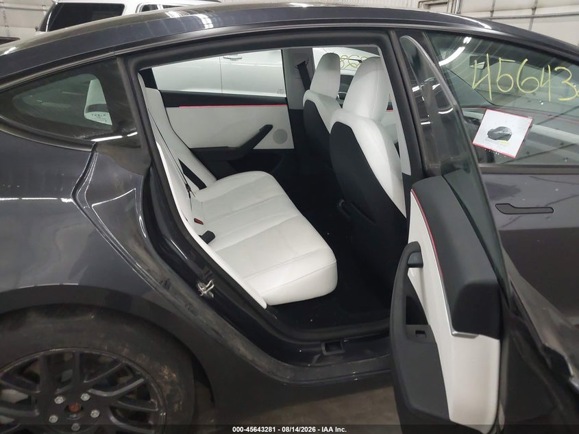 2024 Tesla Model 3 VIN 5YJ3E1EB2RF810923 IAAI salvage auction — REAR END, Clear (Minnesota), sold $21,050 on 2026-09-01 (photo 8)
