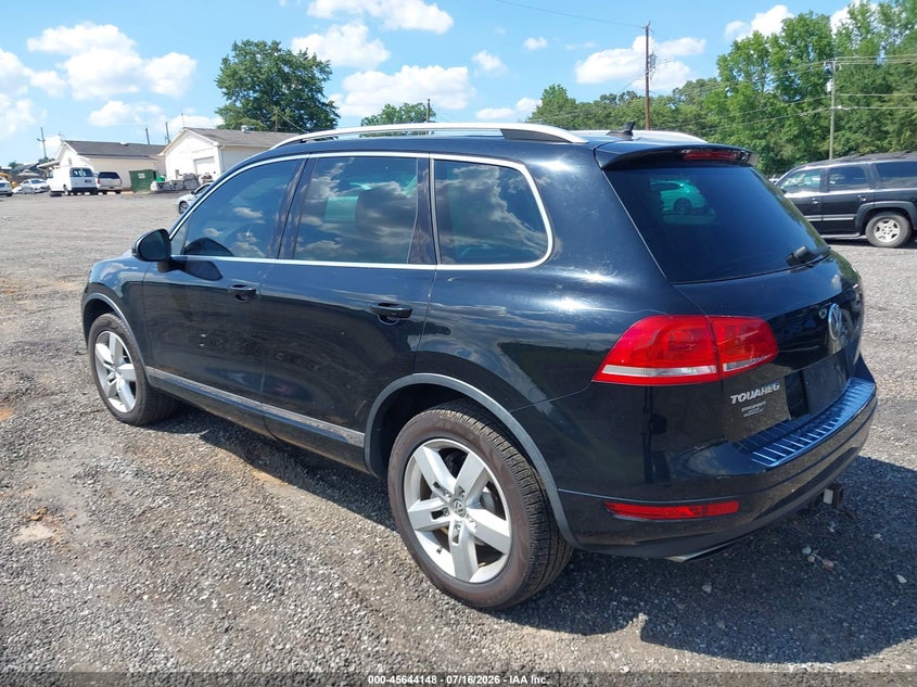 2014 Volkswagen Touareg VIN WVGEP9BP8ED001134 IAAI salvage auction — NORMAL WEAR, Salvage Title, sold $375 on 2026-07-21 (photo 3)