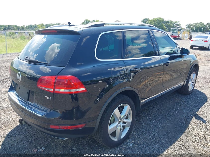 2014 Volkswagen Touareg VIN WVGEP9BP8ED001134 IAAI salvage auction — NORMAL WEAR, Salvage Title, sold $375 on 2026-07-21 (photo 4)
