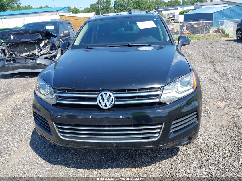 2014 Volkswagen Touareg VIN WVGEP9BP8ED001134 IAAI salvage auction — NORMAL WEAR, Salvage Title, sold $375 on 2026-07-21 (photo 6)
