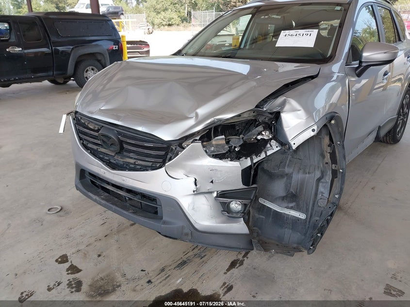 2016 Mazda Cx-5 VIN JM3KE4DY1G0673950 IAAI salvage auction — RIGHT FRONT, Salvage Title, sold $1,400 on 2026-07-30 (photo 6)