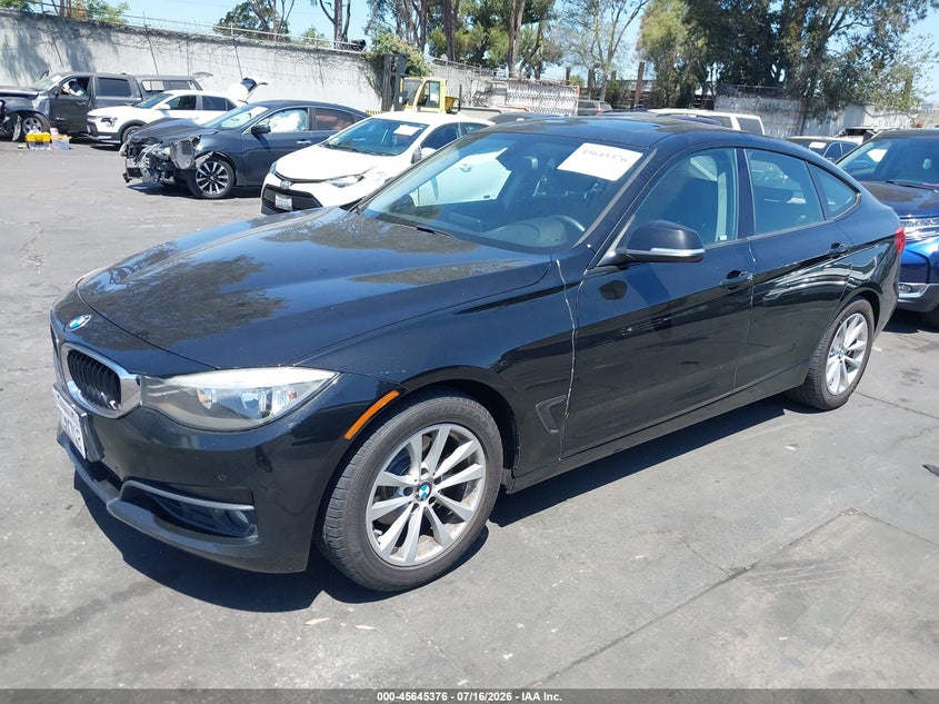 2014 BMW 3er VIN WBA3X5C58ED242545 IAAI salvage auction — LEFT FRONT, Salvage Certificate (California), sold $2,700 on 2026-07-31 (photo 2)