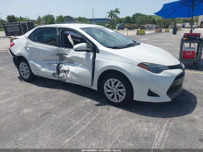 2018 Toyota Corolla VIN 5YFBURHE6JP853124 IAAI salvage auction — NORMAL WEAR, Clear (Florida), sold $1,600 on 2026-07-30 (photo 1)
