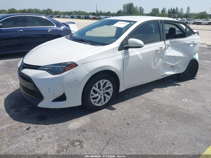 2018 Toyota Corolla VIN 5YFBURHE6JP853124 IAAI salvage auction — NORMAL WEAR, Clear (Florida), sold $1,600 on 2026-07-30 (photo 2)
