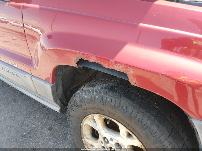 2001 Jeep Grand cherokee VIN 1J4GW48N11C667075 IAAI salvage auction — NORMAL WEAR, Clear (Colorado), sold $150 on 2026-07-22 (photo 6)