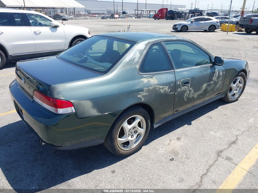 1999 Honda Prelude VIN JHMBB6241XC009402 IAAI salvage auction — NORMAL WEAR, Salvage Title, sold $100 on 2026-07-21 (photo 4)