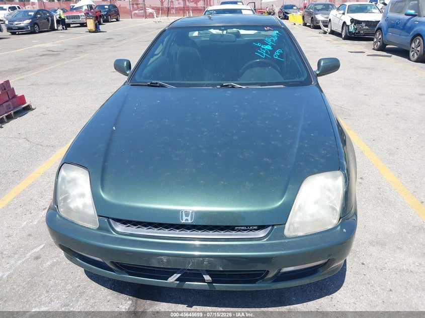 1999 Honda Prelude VIN JHMBB6241XC009402 IAAI salvage auction — NORMAL WEAR, Salvage Title, sold $100 on 2026-07-21 (photo 6)