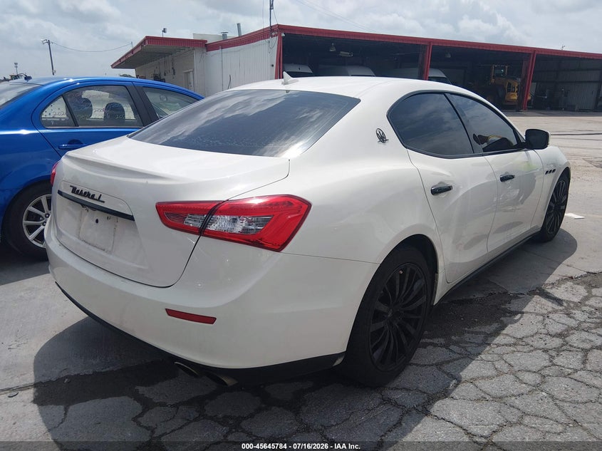 2016 Maserati Ghibli VIN ZAM57XSA6G1173778 IAAI salvage auction — NORMAL WEAR, Original (Texas), sold $5,100 on 2026-08-03 (photo 4)