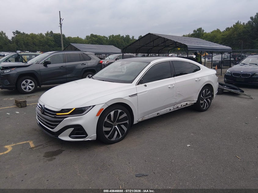 2021 Volkswagen Arteon VIN WVWSR7AN7ME010759 IAAI salvage auction — SIDE, Salvage Title, sold $9,700 on 2026-08-10 (photo 2)