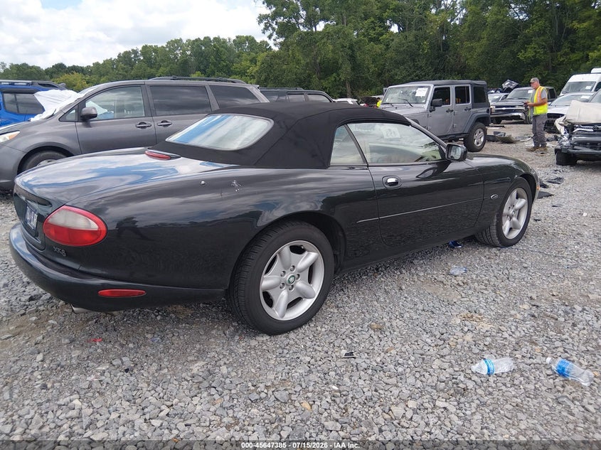 1997 Jaguar Xk VIN SAJGX2745VC003126 IAAI salvage auction — NORMAL WEAR, Clear (Tennessee), sold $400 on 2026-07-23 (photo 4)