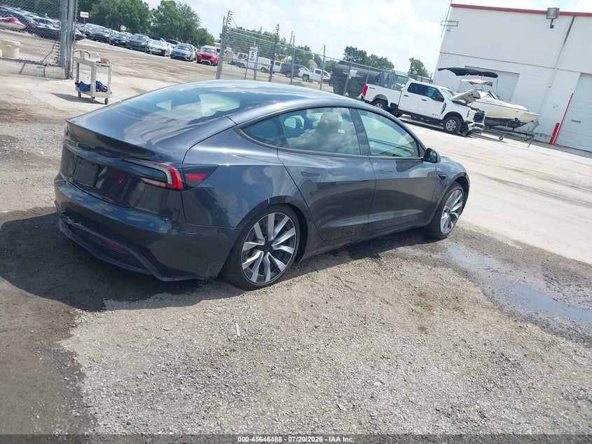 2026 Tesla Model 3 VIN 5YJ3E1EA4TF167067 IAAI salvage auction — LEFT REAR, Rebuildable (Florida), sold $14,500 on 2026-09-08 (photo 4)
