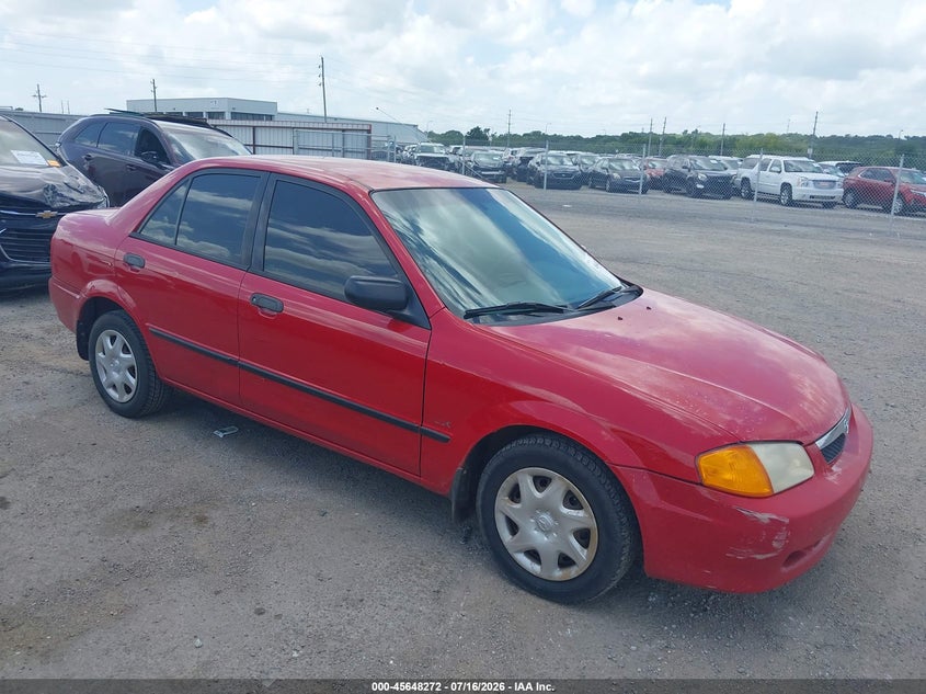 2000 Mazda Protege VIN JM1BJ2225Y0246487 IAAI salvage auction — NORMAL WEAR, Clear (Oklahoma), sold $25 on 2026-07-21 (photo 1)