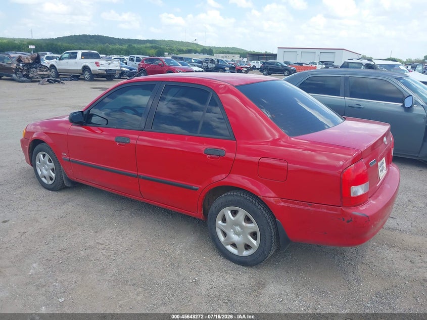 2000 Mazda Protege VIN JM1BJ2225Y0246487 IAAI salvage auction — NORMAL WEAR, Clear (Oklahoma), sold $25 on 2026-07-21 (photo 3)