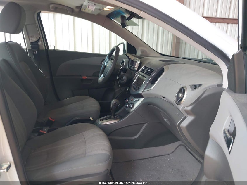 2013 Chevrolet SONIC VIN 1G1JC5SB2D4200036 IAAI salvage auction — NORMAL WEAR, Clear - Public Restricted (Oklahoma), sold $275 on 2026-07-27 (photo 5)