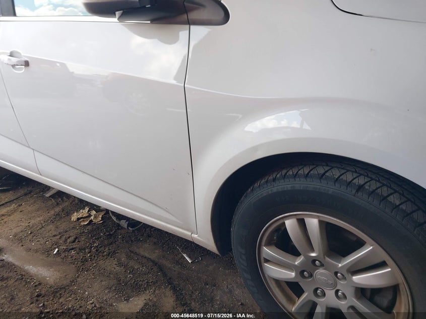 2013 Chevrolet SONIC VIN 1G1JC5SB2D4200036 IAAI salvage auction — NORMAL WEAR, Clear - Public Restricted (Oklahoma), sold $275 on 2026-07-22 (photo 6)