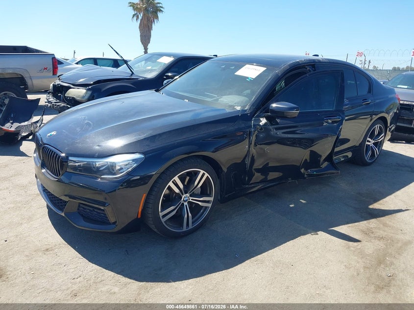2018 BMW 7er VIN WBA7E2C5XJG741846 IAAI salvage auction — SIDE, Wait Title, sold $7,600 on 2026-08-16 (photo 2)