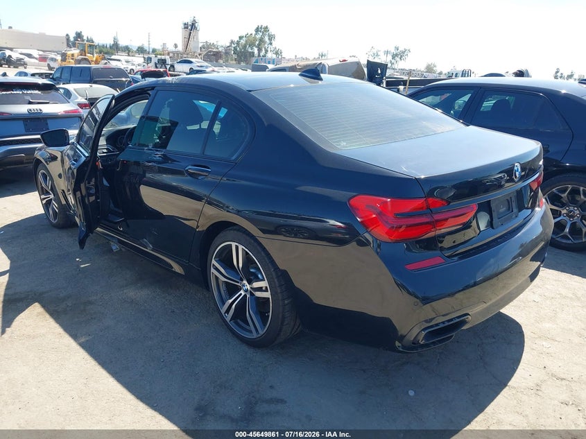 2018 BMW 7er VIN WBA7E2C5XJG741846 IAAI salvage auction — SIDE, Wait Title, sold $7,600 on 2026-08-16 (photo 3)
