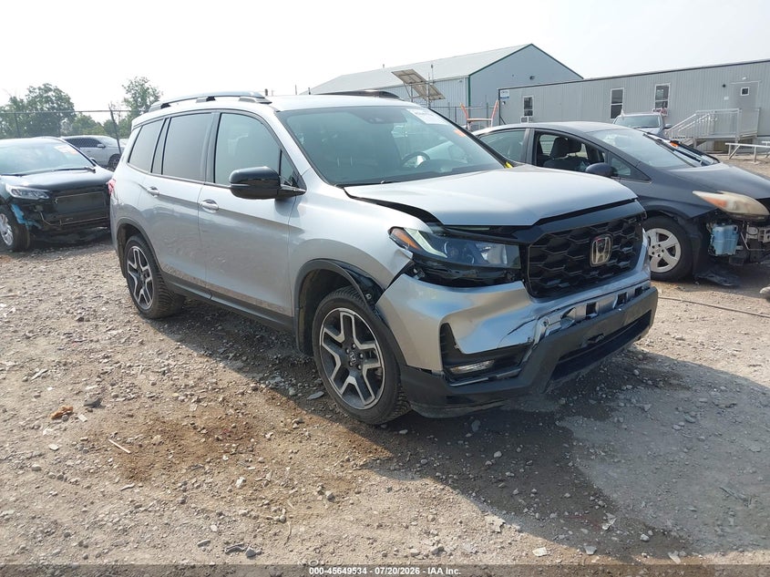 2023 Honda Passport VIN 5FNYF8H06PB030393 — IAAI salvage auction photo