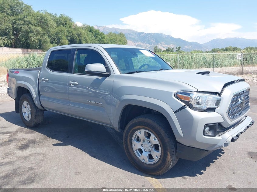 2018 Toyota Tacoma VIN 3TMCZ5AN8JM163102 IAAI salvage auction — FRONT & REAR, Salvage Title, sold $12,100 on 2026-08-05 (photo 1)