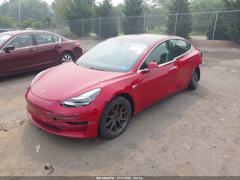 2018 Tesla Model 3 VIN 5YJ3E1EA6JF122970 IAAI salvage auction — FRONT & REAR, Wait Title, sold $4,400 on 2026-09-11 (photo 2)