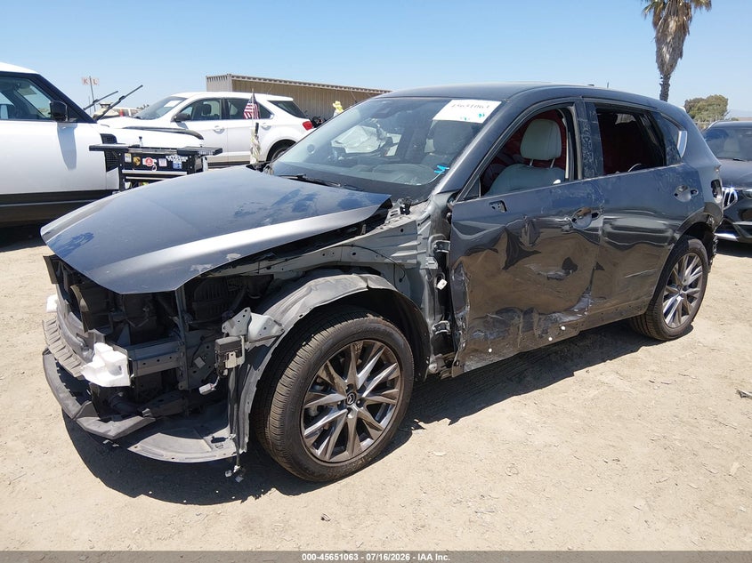 2021 Mazda Cx-5 VIN JM3KFBAYXM0377262 IAAI salvage auction — SIDE, Salvage (California), sold $5,400 on 2026-08-02 (photo 2)