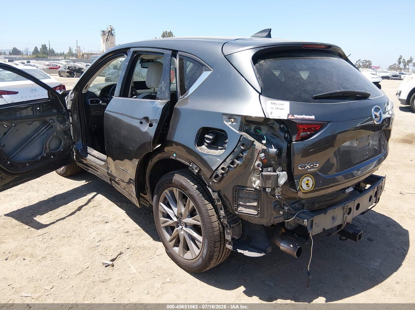 2021 Mazda Cx-5 VIN JM3KFBAYXM0377262 IAAI salvage auction — SIDE, Salvage (California), sold $5,400 on 2026-08-02 (photo 3)