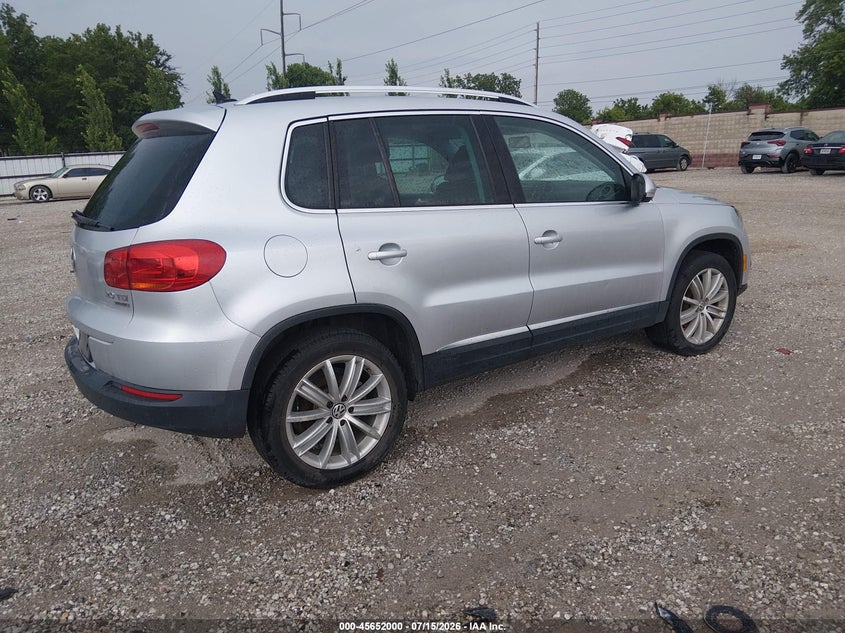 2012 Volkswagen Tiguan VIN WVGBV7AX5CW531321 IAAI salvage auction — NORMAL WEAR, Salvage (Wisconsin), sold $475 on 2026-07-27 (photo 4)