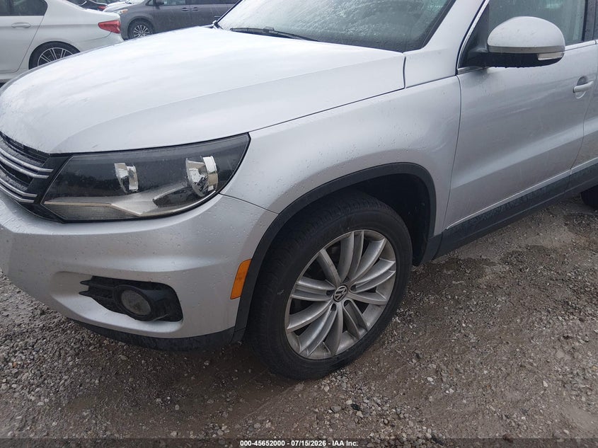 2012 Volkswagen Tiguan VIN WVGBV7AX5CW531321 IAAI salvage auction — NORMAL WEAR, Salvage (Wisconsin), sold $475 on 2026-07-27 (photo 6)