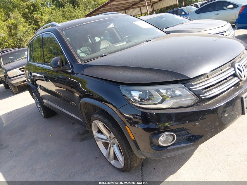2014 Volkswagen Tiguan VIN WVGAV3AX4EW558727 IAAI salvage auction — NORMAL WEAR, Wait Title, sold $1,400 on 2026-08-10 (photo 1)