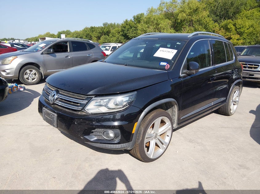 2014 Volkswagen Tiguan VIN WVGAV3AX4EW558727 IAAI salvage auction — NORMAL WEAR, Wait Title, sold $1,400 on 2026-08-10 (photo 2)