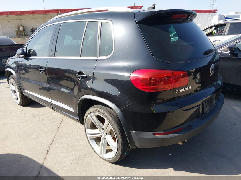 2014 Volkswagen Tiguan VIN WVGAV3AX4EW558727 IAAI salvage auction — NORMAL WEAR, Wait Title, sold $1,400 on 2026-08-10 (photo 3)