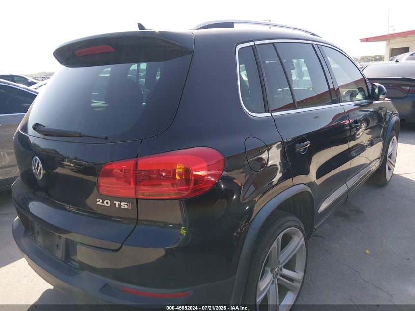 2014 Volkswagen Tiguan VIN WVGAV3AX4EW558727 IAAI salvage auction — NORMAL WEAR, Wait Title, sold $1,400 on 2026-08-10 (photo 4)