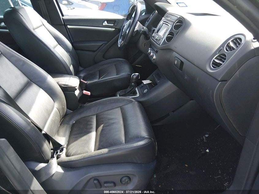 2014 Volkswagen Tiguan VIN WVGAV3AX4EW558727 IAAI salvage auction — NORMAL WEAR, Wait Title, sold $1,400 on 2026-08-10 (photo 5)
