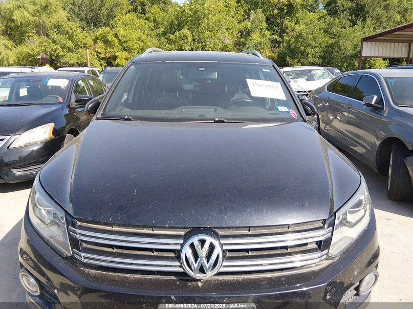 2014 Volkswagen Tiguan VIN WVGAV3AX4EW558727 IAAI salvage auction — NORMAL WEAR, Wait Title, sold $1,400 on 2026-08-10 (photo 6)