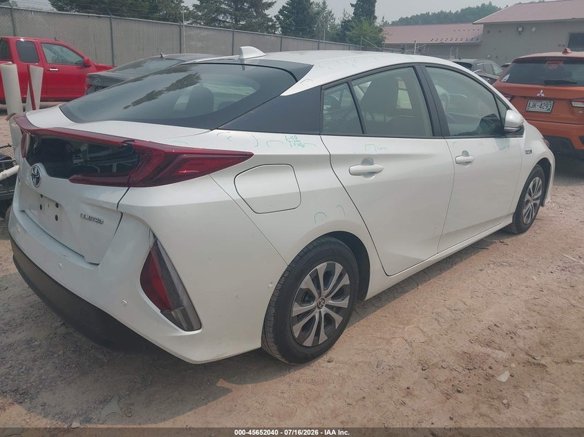 2021 Toyota Prius VIN JTDKAMFP5M3176967 IAAI salvage auction — HAIL, Salvage Title, sold $6,600 on 2026-07-29 (photo 4)