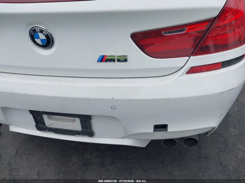 2013 BMW M6 VIN WBSLX9C50DC968763 IAAI salvage auction — THEFT, Wait Title, sold $7,200 on 2026-08-05 (photo 6)
