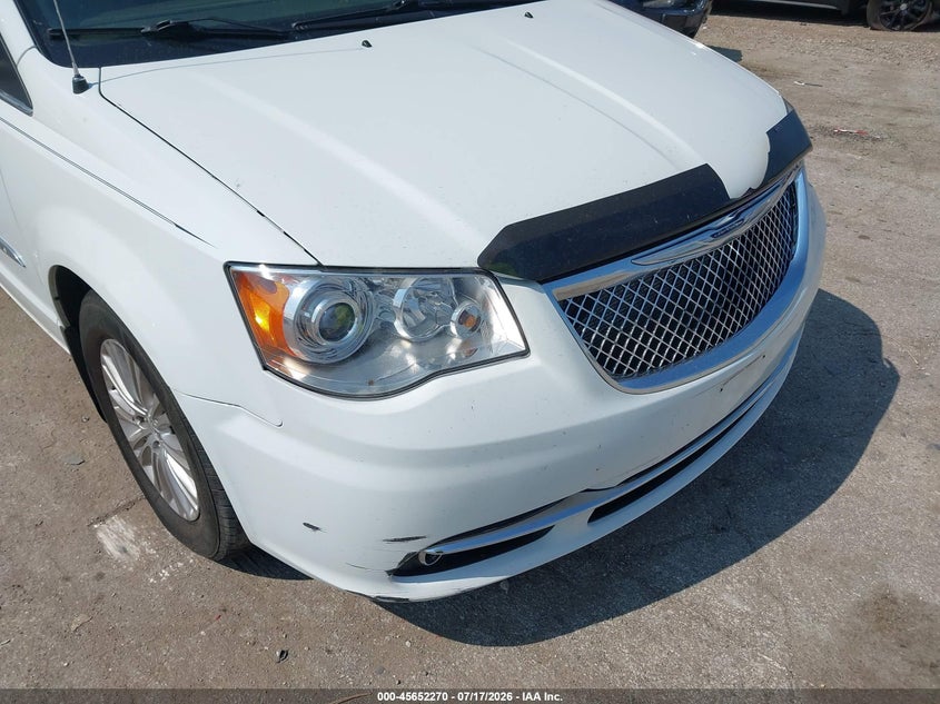 2014 Chrysler Town & country VIN 2C4RC1GG4ER467233 IAAI salvage auction — WATER/FLOOD, Salvage Title, sold $425 on 2026-09-10 (photo 6)