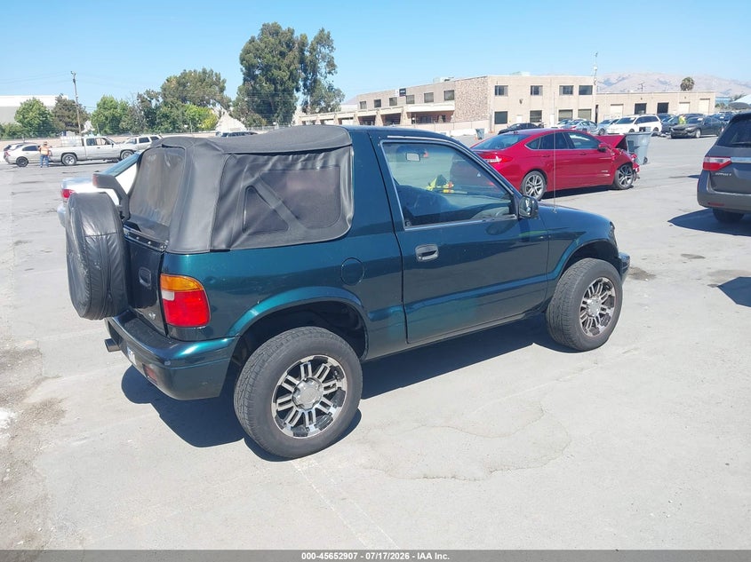 2001 Kia Sportage VIN KNDJB623015705491 IAAI salvage auction — NORMAL WEAR, Clear - Dealer Only (California), sold $325 on 2026-07-29 (photo 4)