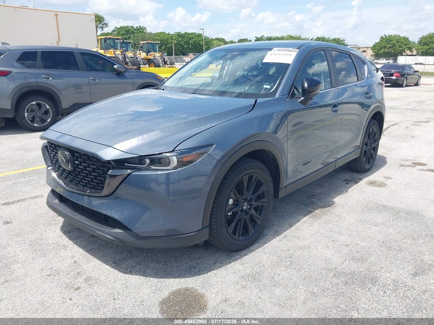 2025 Mazda Cx-5 VIN JM3KFBCM9S0696501 IAAI salvage auction — SIDE, Clear, sold $9,700 on 2026-07-30 (photo 2)
