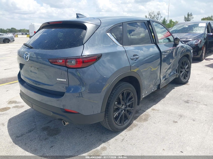 2025 Mazda Cx-5 VIN JM3KFBCM9S0696501 IAAI salvage auction — SIDE, Clear, sold $9,700 on 2026-07-30 (photo 4)