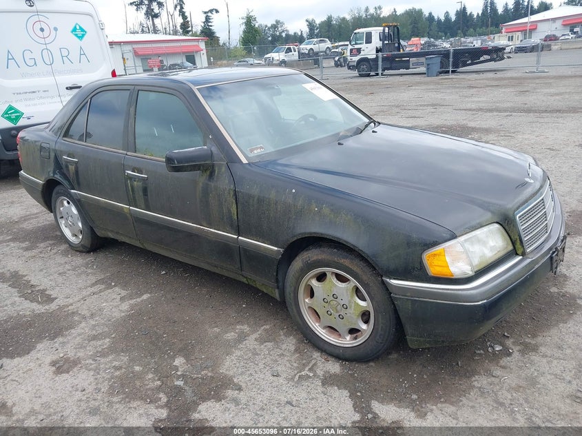 1997 Mercedes-benz C class VIN WDBHA28E2VF503883 IAAI salvage auction — NORMAL WEAR, Clear (Washington), sold $25 on 2026-07-29 (photo 1)