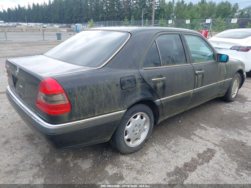 1997 Mercedes-benz C class VIN WDBHA28E2VF503883 IAAI salvage auction — NORMAL WEAR, Clear (Washington), sold $25 on 2026-07-29 (photo 4)