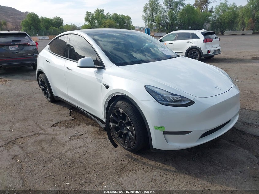 2023 Tesla Model y VIN 7SAYGDEEXPA116702 — IAAI salvage auction photo