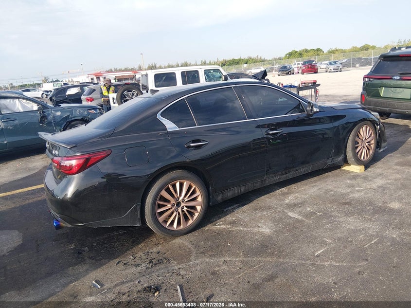 2019 Infiniti Q50 VIN JN1EV7APXKM519552 IAAI salvage auction — WATER/FLOOD, Wait Title, sold $1,500 on 2026-09-04 (photo 4)