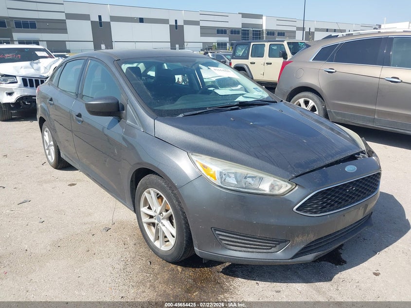 2018 Ford Focus VIN 1FADP3F27JL328867 IAAI salvage auction — LEFT SIDE, Wait Title, sold $1,050 on 2026-09-11 (photo 1)