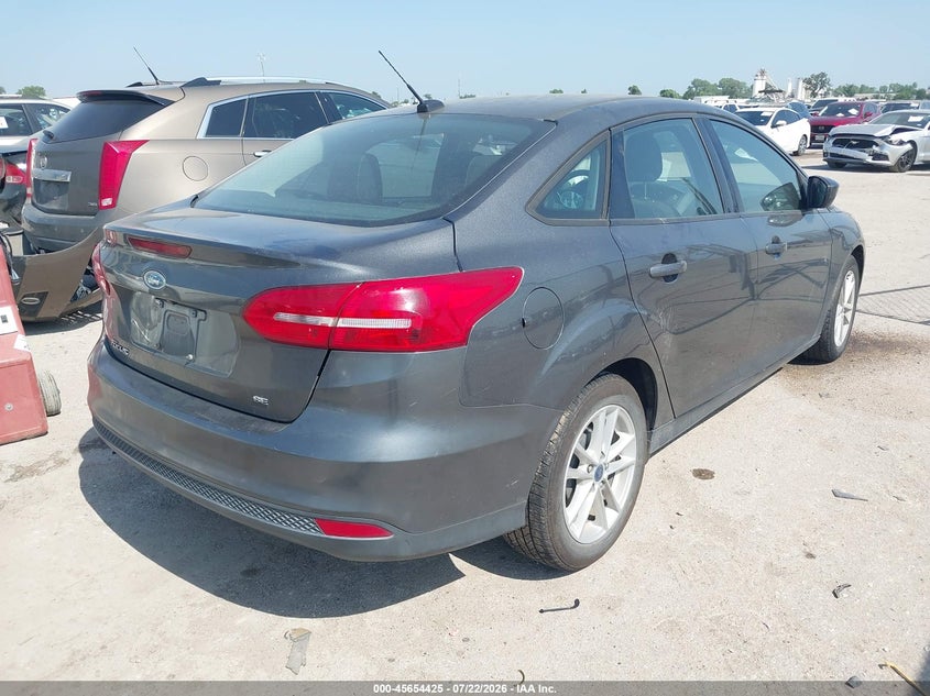 2018 Ford Focus VIN 1FADP3F27JL328867 IAAI salvage auction — LEFT SIDE, Wait Title, sold $1,050 on 2026-09-11 (photo 4)