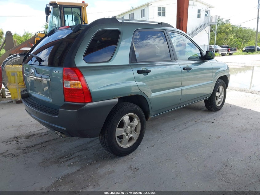 2007 Kia Sportage VIN KNDJF724X77381286 IAAI salvage auction — NORMAL WEAR, Clear (Florida), sold $550 on 2026-07-28 (photo 4)