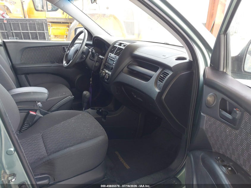 2007 Kia Sportage VIN KNDJF724X77381286 IAAI salvage auction — NORMAL WEAR, Clear (Florida), sold $550 on 2026-07-28 (photo 5)