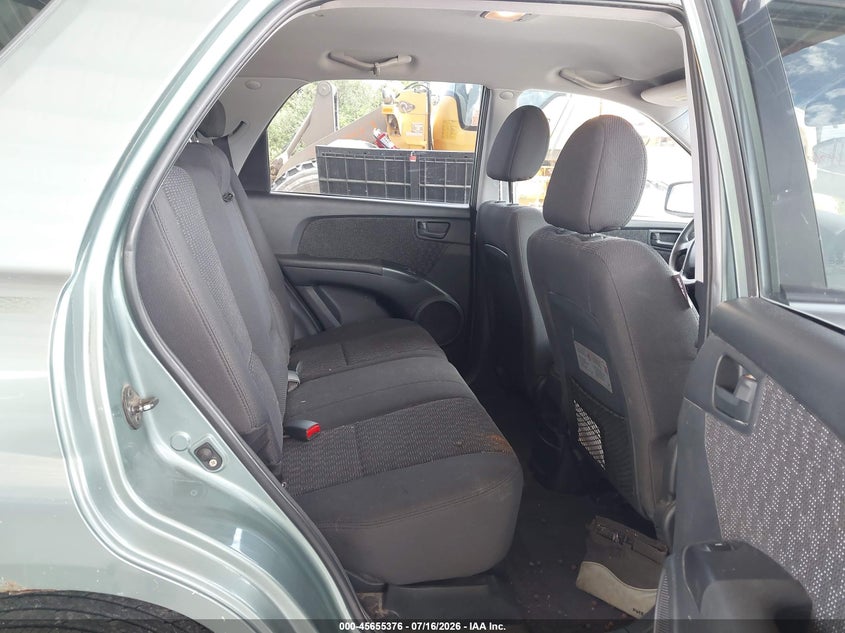 2007 Kia Sportage VIN KNDJF724X77381286 IAAI salvage auction — NORMAL WEAR, Clear (Florida), sold $550 on 2026-07-28 (photo 8)