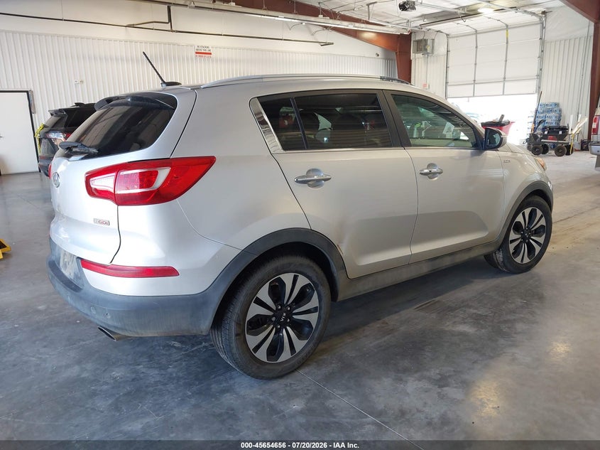 2011 Kia Sportage VIN KNDPCCA6XB7151223 IAAI salvage auction — NORMAL WEAR, Clear (Colorado), sold $350 on 2026-07-29 (photo 4)